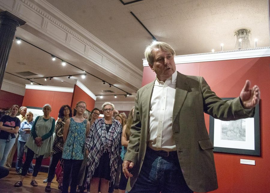 Charles Brindley details his works and process to a crowd in his exhibit, "Salient Features: Trees of Old Forest and Woodland Pastures", on September 25th. Brindley and The Kentucky Museum host this artist talk to boost gallery community interaction.