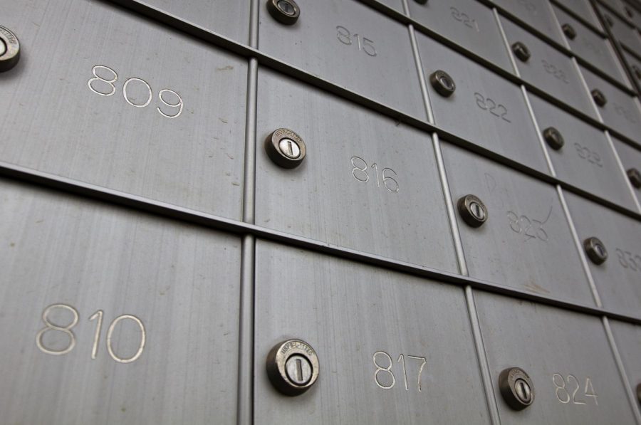 Mailboxes at The Crown apartments hang empty after tenants stopped receiving mail after the United States Postal Service reclassified apartment complexes to dormitories. Tenants like Nicole Cortez and her roommates took matters into their own hands. “We’ve had to get a P.O. Box just so we can get our mail,” Cortez said.
