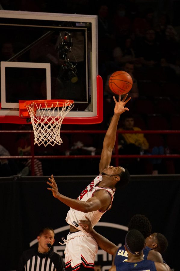 Charles Bassey (23) scores on a fast break play as WKU Hilltoppers pick up the win 91-58 during their game against the FIU Panthers.