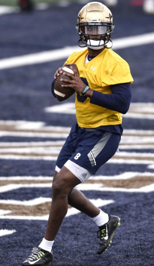 Montana State quarterback Matthew McKay runs a drill March 23 at Bobcat Stadium.