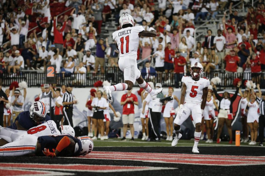 WKU wide receiver Malachi Corley (11) celebrates scoring a touchdown during the Hilltoppers' season-opening 59-21 win over UT Martin on Sept. 2, 2021. 