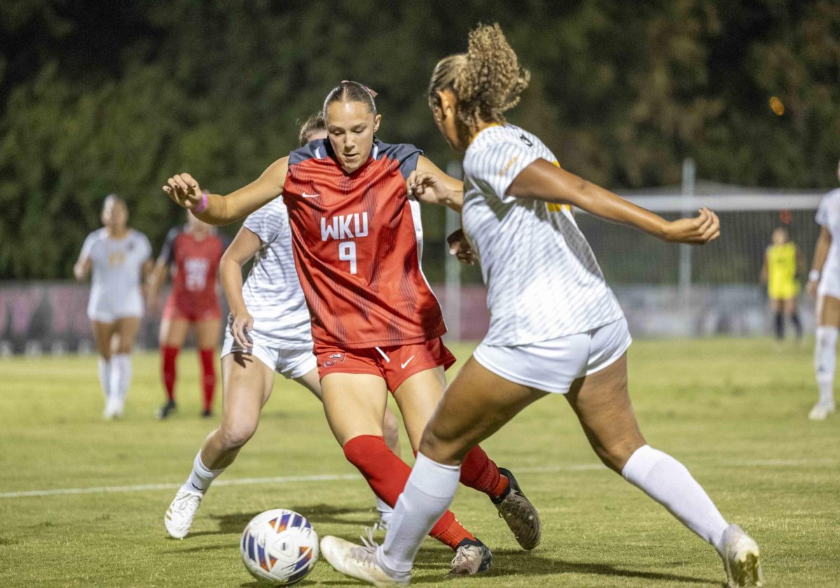 Western Kentucky University midfielder Maggie Morris (9) looks to steal the ball during a match against Kennesaw State University at the WKU Soccer Complex on Thursday, Oct. 3, 2024. 