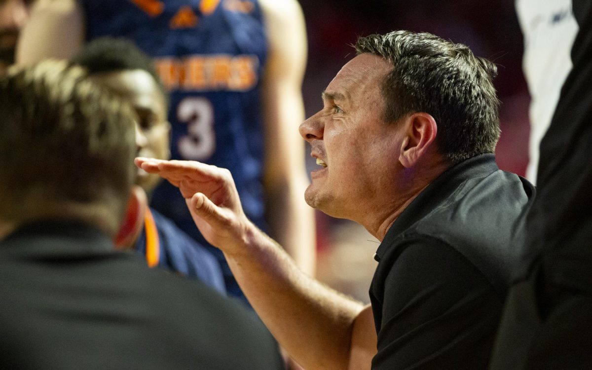 UTEP Head Coach Joe Golding speaks with his team during a timeout during the Hilltoppers game against the UTEP Miners in Bowing Green, Ky. on Thursday, Jan. 30, 2025. 