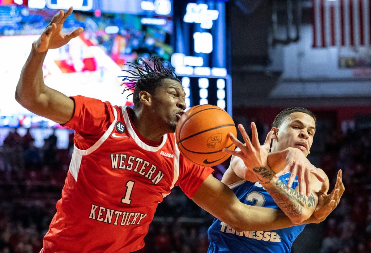 Western Kentucky Hilltoppers forward Blaise Keita (1) goes for a loose ball during a game against Middle Tennessee State University in Diddle Arena on Saturday, Feb. 15, 2025. 
