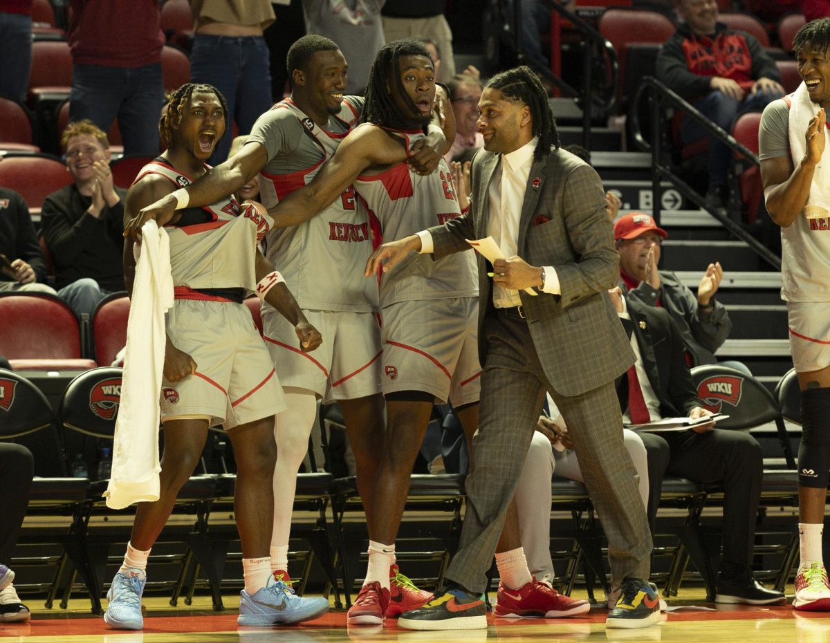 Western Kentucky basketball players cheer after a contact layup made by guard Tyler Olden (31) during a game against the New Mexico State Aggies in Diddle Arena on Saturday, Feb. 1  2025. 