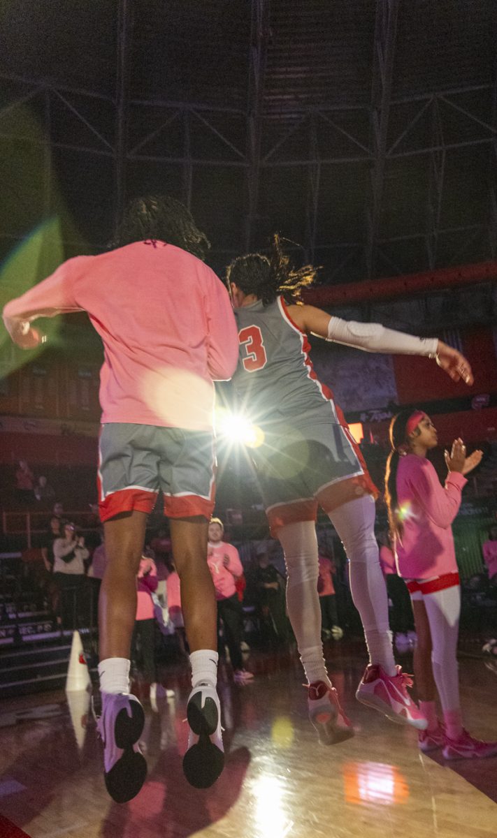 Western Kentucky Lady Toppers guard Alexis Mead (3) shoulder bumps her opponent before taking the court during a game against University of Texas El Paso at Diddle Arena on Thursday, Feb. 27, 2025.