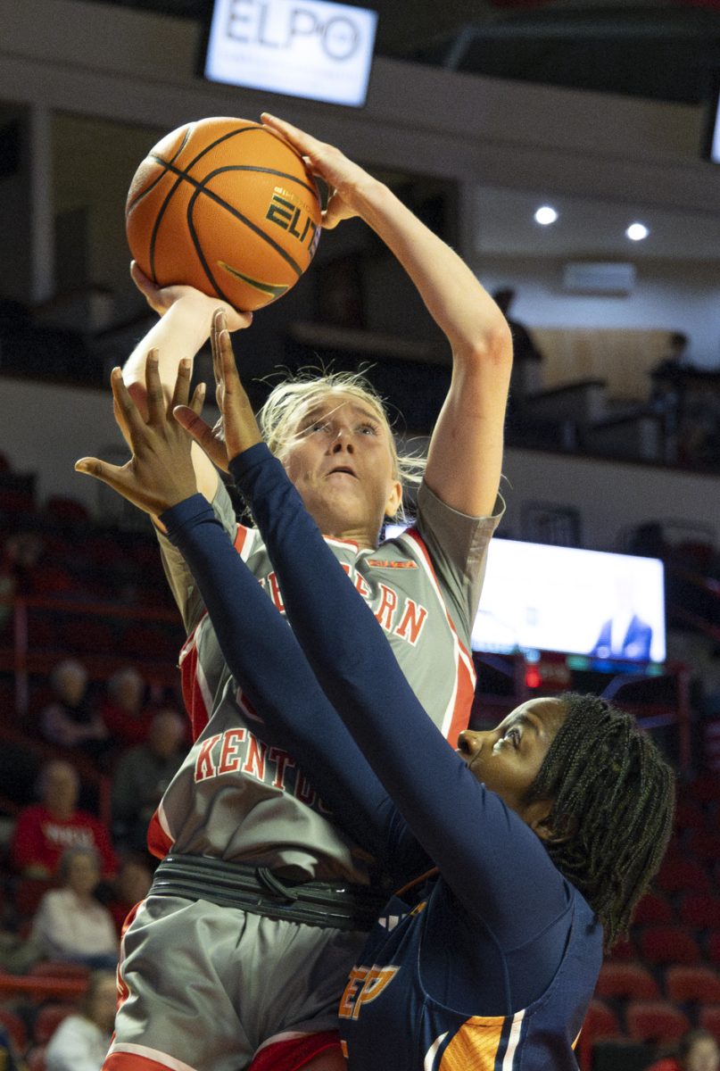 Western Kentucky Lady Toppers guard Josie Gilvin (33) shoots the ball over her opponent during a game against University of Texas El Paso at Diddle Arena on Thursday, Feb. 27, 2025.