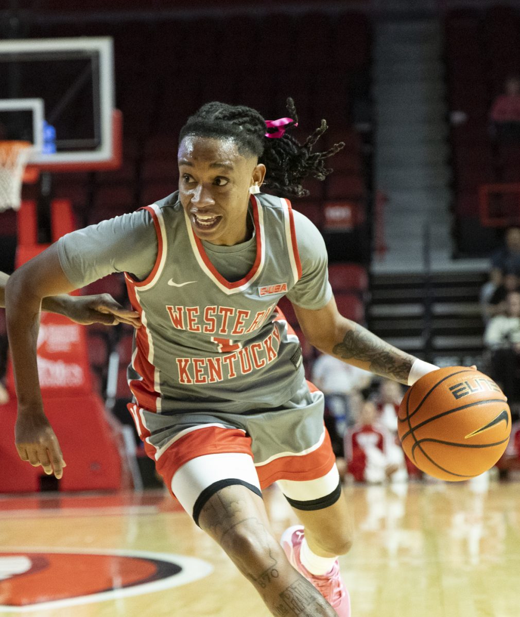 Western Kentucky Lady Toppers guard Destiny Salary (1) drives into the paint during a game against University of Texas El Paso at Diddle Arena on Thursday, Feb. 27, 2025.