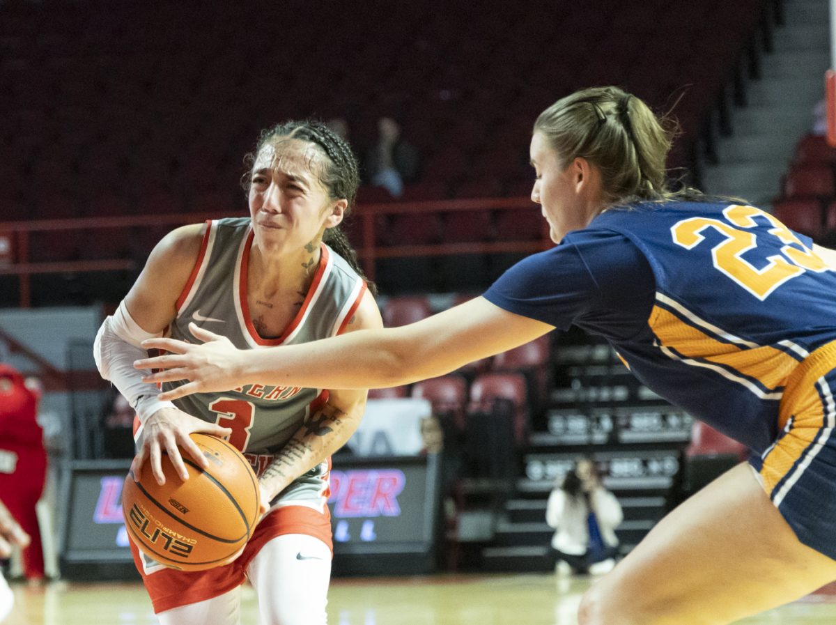 Western Kentucky University guard Alexis Mead (3) drives through her opponents during a game against University of Texas El Paso at Diddle Arena on Thursday, Feb. 27, 2025.