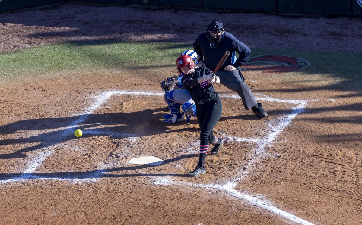 Western Kentucky Hilltoppers infield Charlotte Herron (20) swings at the ball during the game at the WKU Softball Complex on Friday, Feb. 28, 2025 