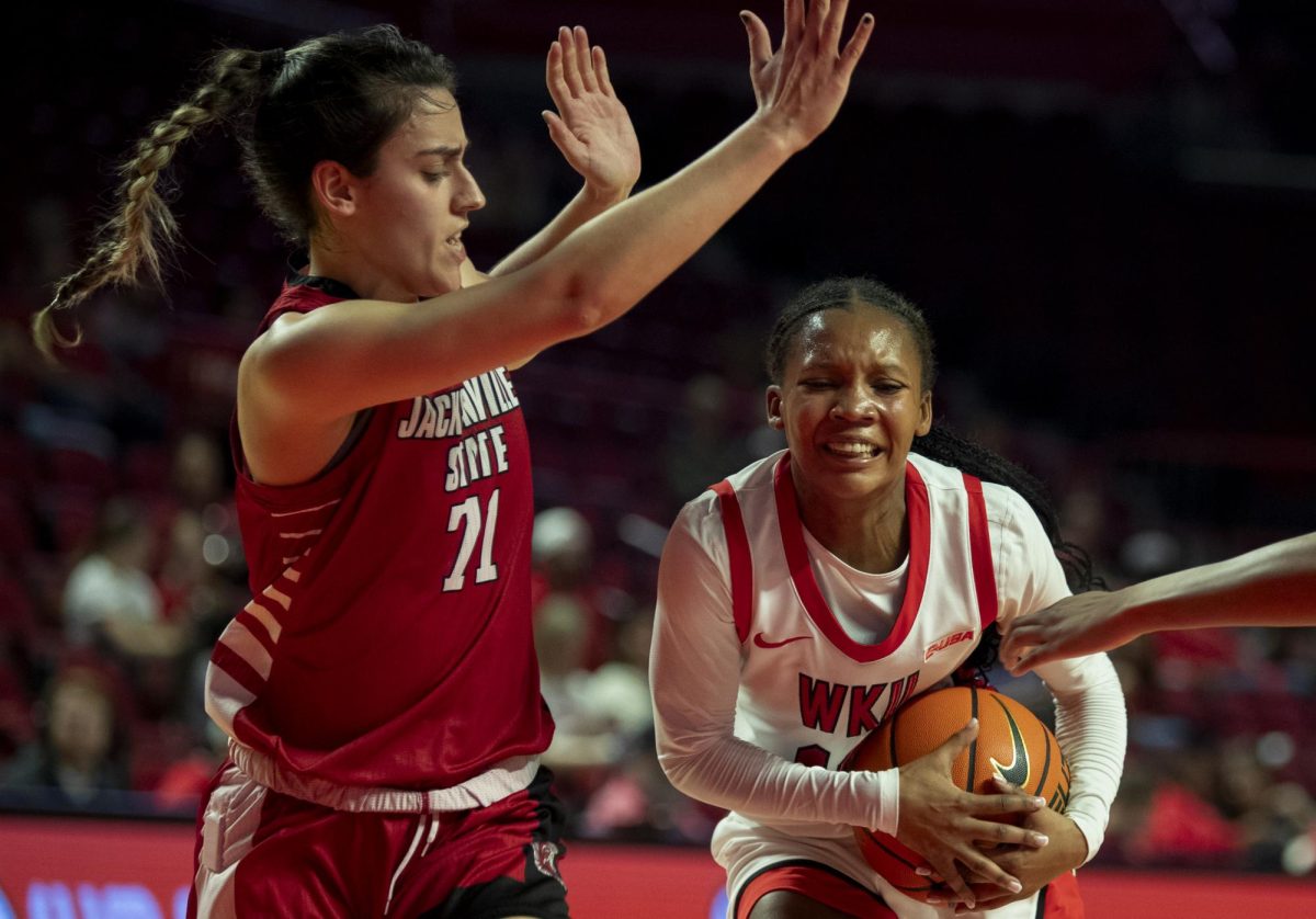 Western Kentucky Lady Toppers guard Acacia Hayes (10) drives the ball through traffic during the matchup against Jacksonville State University at E.A Diddle Arena on Saturday, Feb. 8., 2025. 