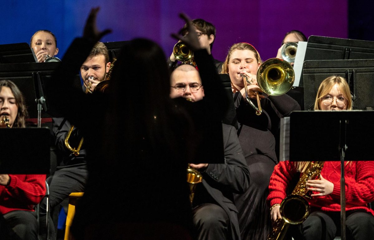 Sarah Herbert, Jazz and director conducts the Jazz Band during the WKU Symphonic Band and Jazz Band Combined Concert in Van Meter Hall on Friday, March 7, 2025.