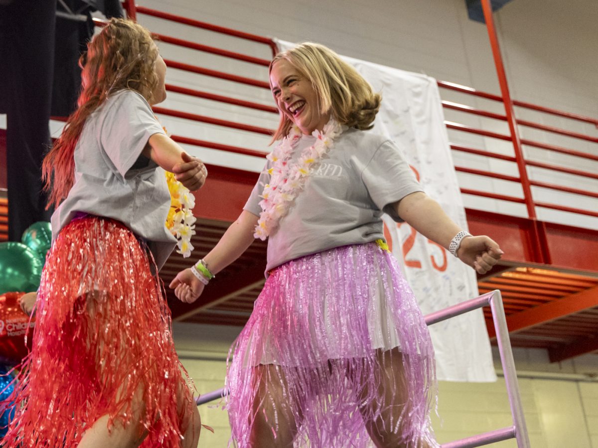 Chloe Howard shimmies her shoulders while teaching the 2025 dance during the annual Dance Big Red event in Preston Center at Western Kentucky University to raise money for Norton Children’s Hospital on March 7, 2025.