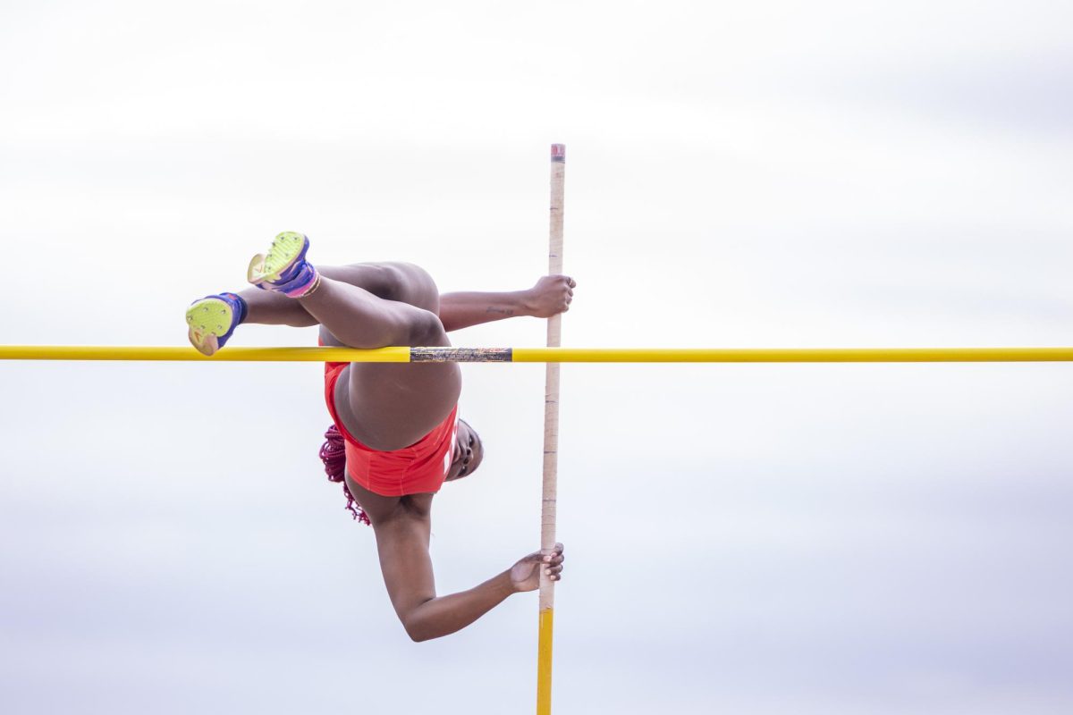 Naiah Rolle attempts to clear the bar during the Brent Chumbley Memorial Hilltopper Relays at the WKU Track and Field Complex in Bowling Green, Ky. on Saturday, March 29, 2025. 