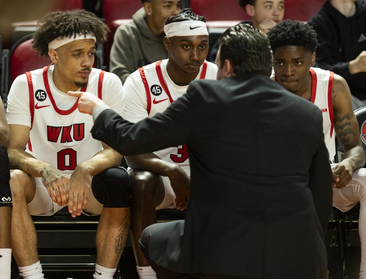 Western Kentucky Hilltoppers basketball head coach Hank Plona talks with his starting lineup prior to the Toppers basketball game vs. the Florida International University Panthers at E.A. Diddle Arena on March, 6, 2025. WKU won 76-67.
