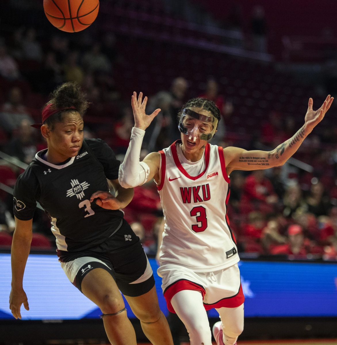 Western Kentucky Lady Toppers guard Alexis Mead (3) looses possession while attempting a layup during the Lady Toppers basketball game vs. the New Mexico State University Aggies at E.A. Diddle Arena on March, 1, 2025. WKU won 85-68.