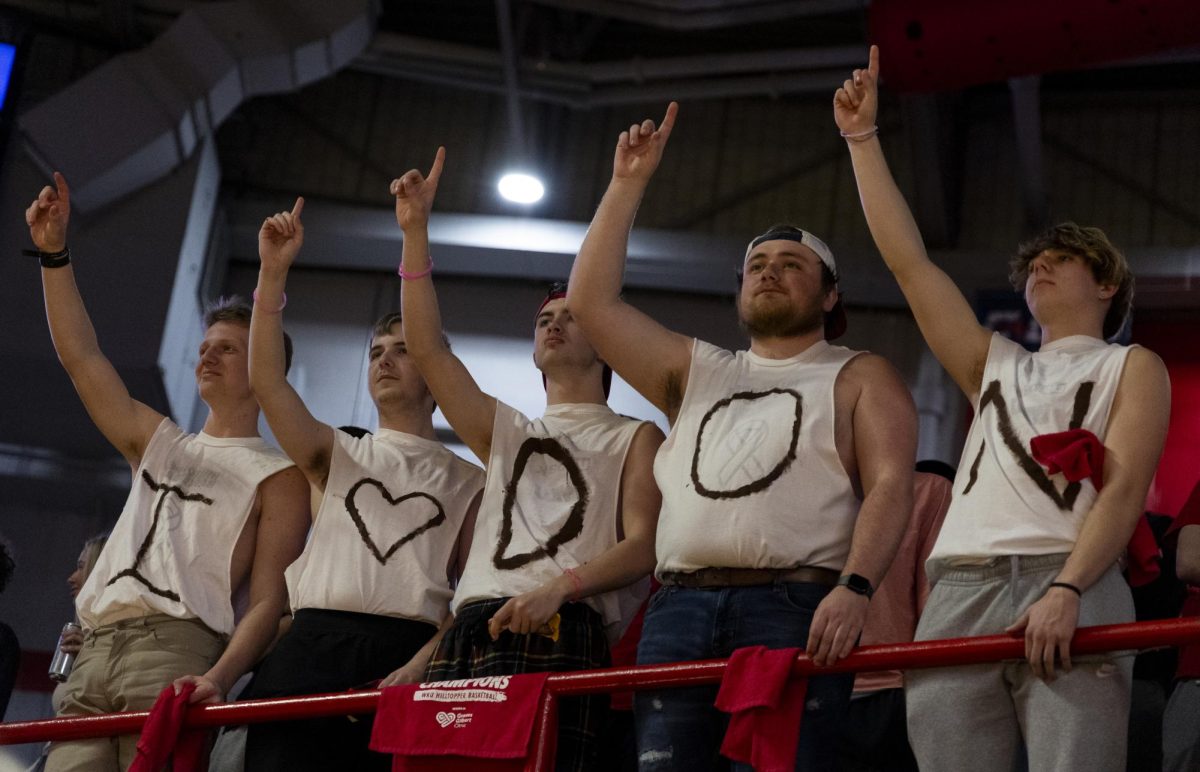 Western Kentucky University students wearing shirts that spell “I (heart) DON” in support of Western Kentucky Hilltoppers guard Don McHenry (2) watch as WKU shoots a free throw during the Toppers basketball game vs. the Florida International University Panthers at E.A. Diddle Arena on March, 6, 2025. WKU won 76-67.