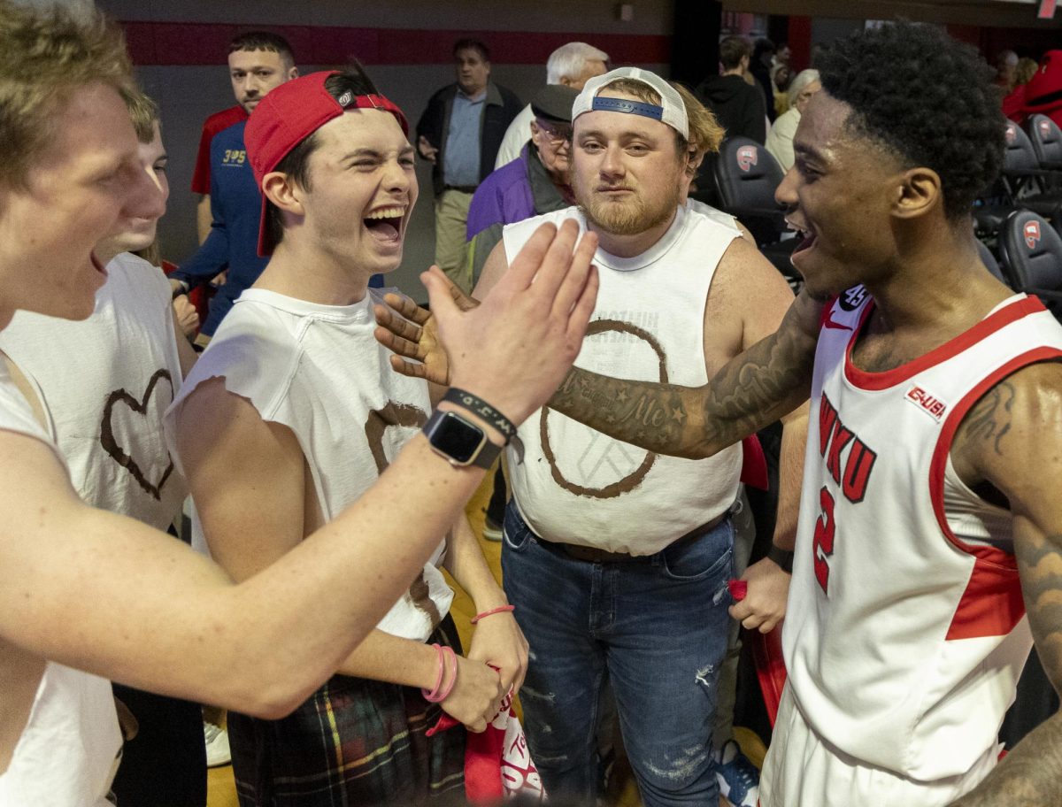 Western Kentucky University students wearing shirts that spell “I (heart) DON” in support of Western Kentucky Hilltoppers guard Don McHenry (2) meet with McHenry after the Toppers basketball game vs. the Florida International University Panthers at E.A. Diddle Arena on March, 6, 2025. WKU won 76-67.